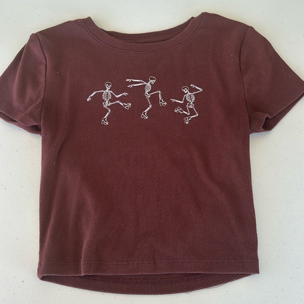 brown skeleton top